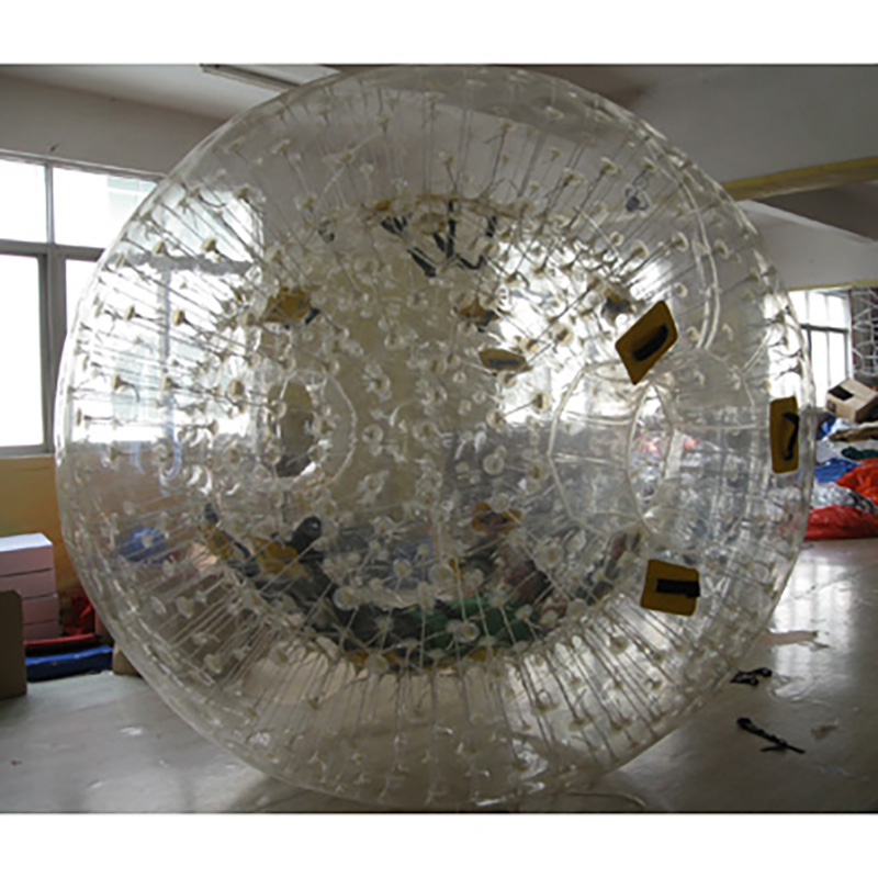 Customised Dry Clear Tpu Zorb With White Ropes, Clear Dots, With Two Harness On Outdoor Grass